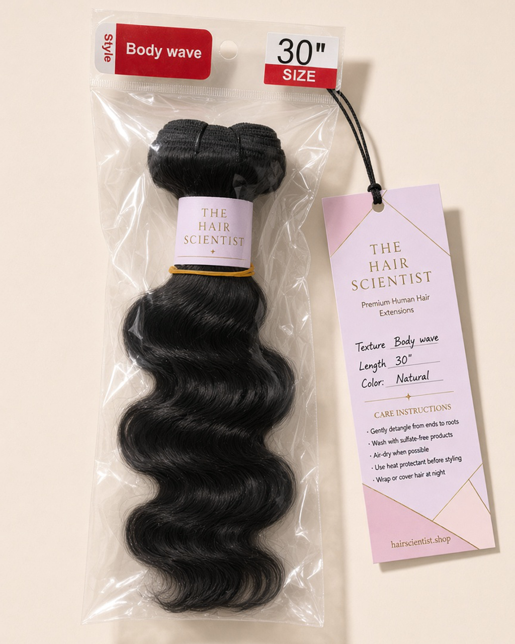 Natural color body wave bundle sealed in a clear bag with a size label and The Hair Scientist hang tag